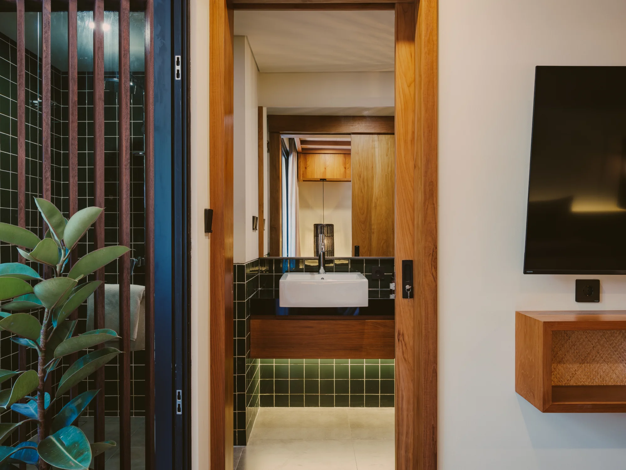 Minimalist ensuite bathroom with modern fixtures and walk-in shower