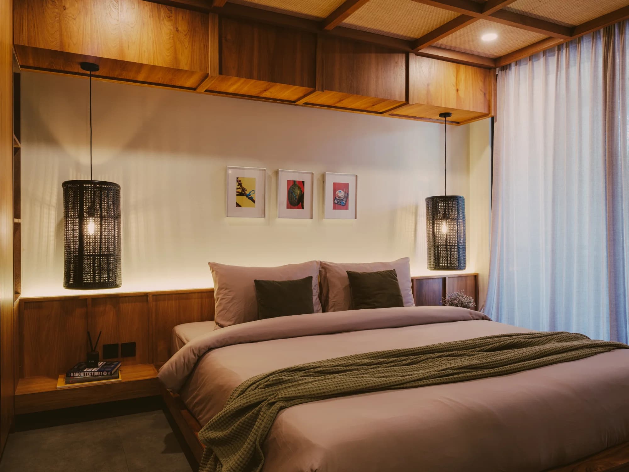 Classic Studio bedroom with king bed, natural light, and ambient wooden accents