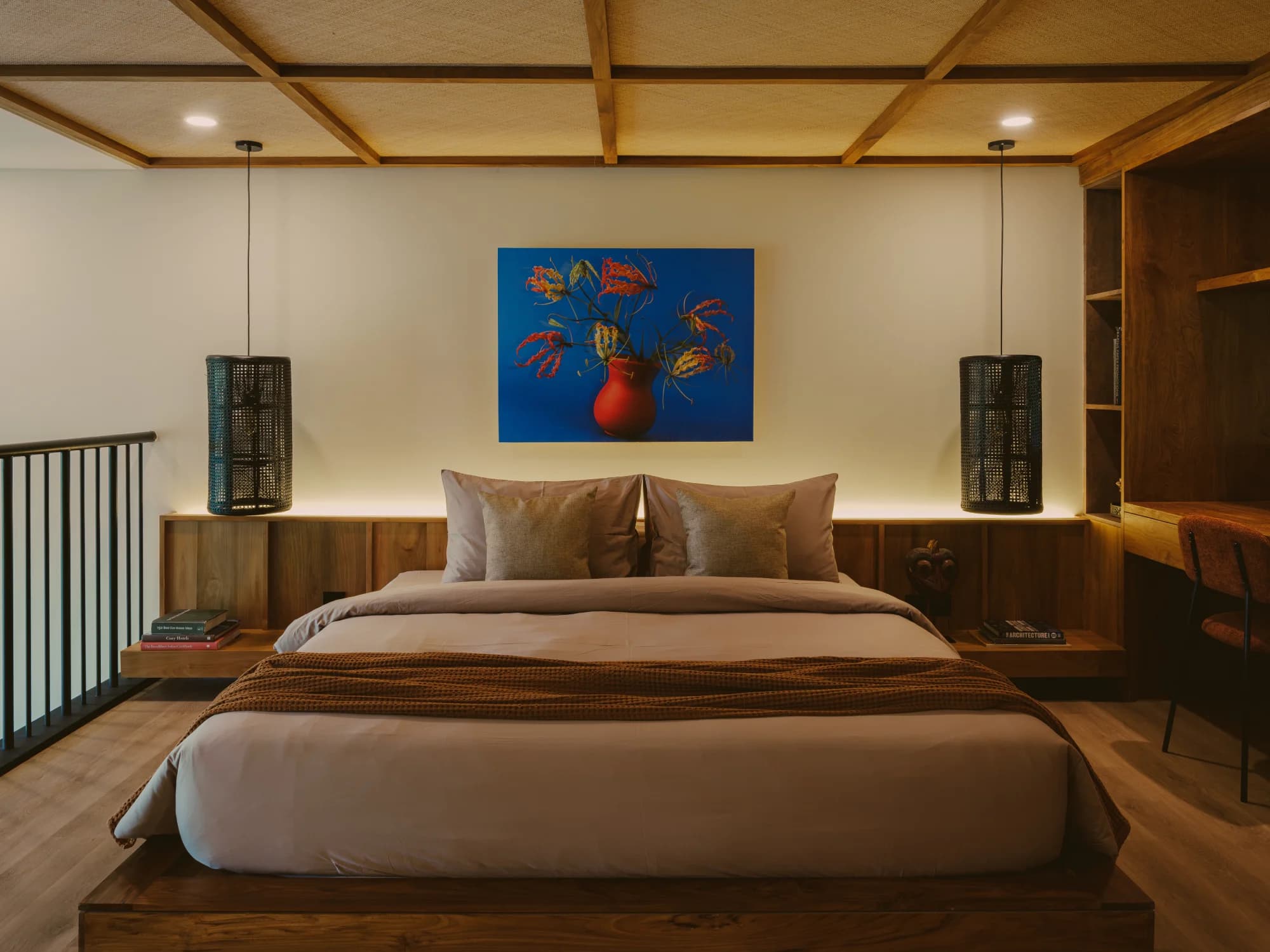 Premium 70 sqm duplex suite with warm architectural tones and expansive bedroom