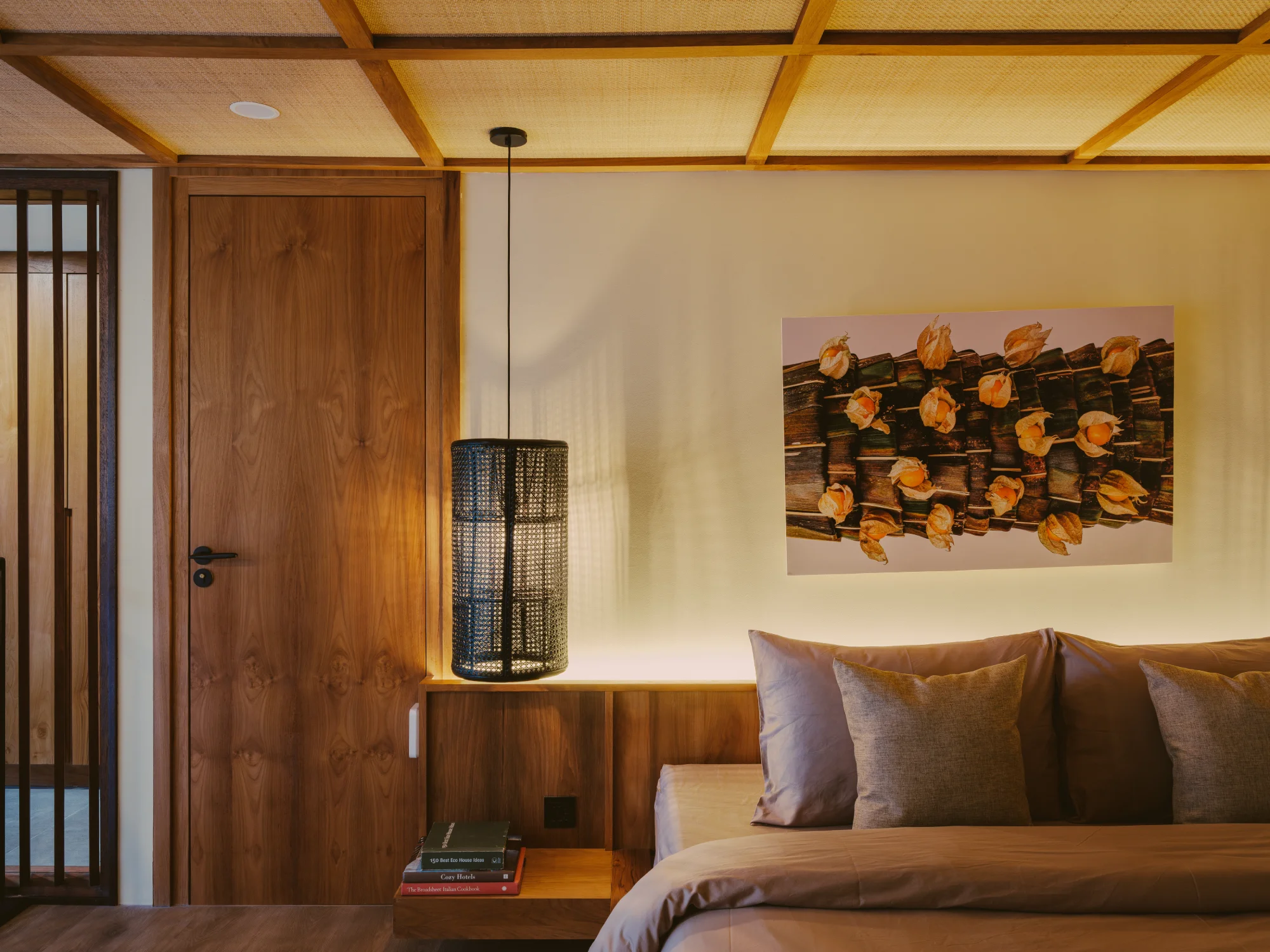 Upper mezzanine bedroom retreat with warm timber ceiling and king bed