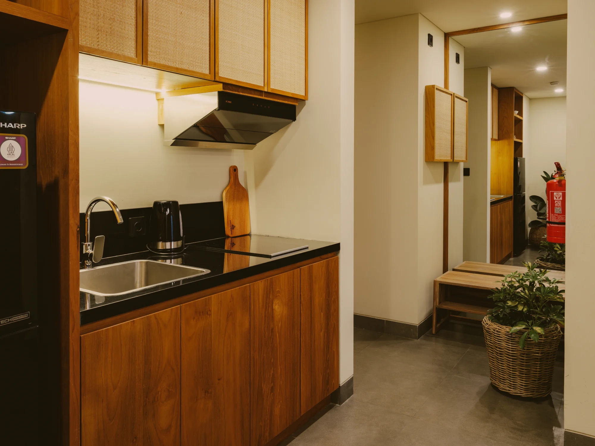 Equipped kitchen station with induction cooktop and sink